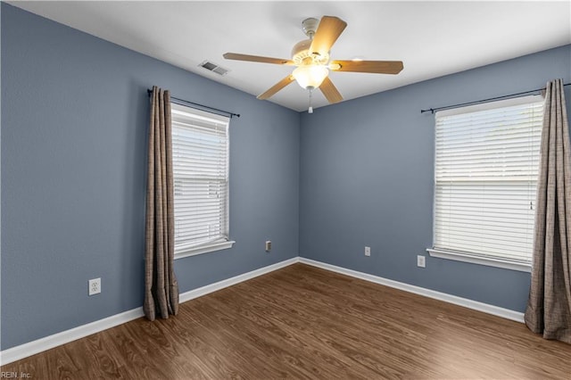4700 Martinique Ct Unit 12, Virginia Beach, VA 23455 - spare room featuring wood finished floors, healthy amount of natural light, a ceiling fan, and baseboards