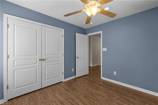 4700 Martinique Ct Unit 12, Virginia Beach, VA 23455 - unfurnished bedroom with baseboards, wood finished floors, a closet, and ceiling fan