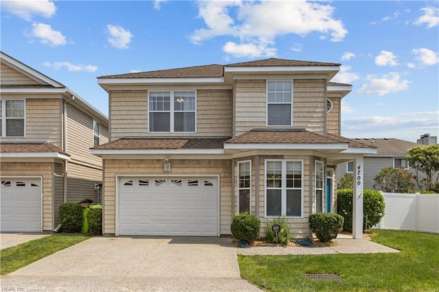 4700 Martinique Ct Unit 12, Virginia Beach, VA 23455 - view of front of house featuring concrete driveway, a garage, and a shingled roof