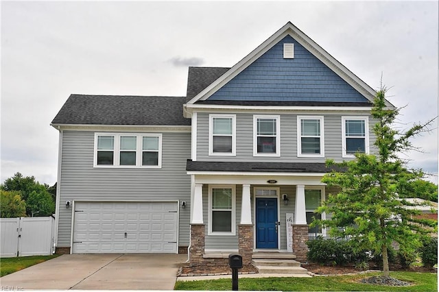 109 Jaclyn Dr, Suffolk, VA 23434 - craftsman-style house featuring an attached garage, concrete driveway, a porch, and a gate