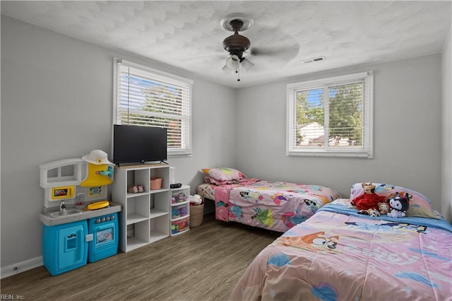 1201 Hale Dr, Hampton, VA 23663 - bedroom featuring wood finished floors, baseboards, and ceiling fan