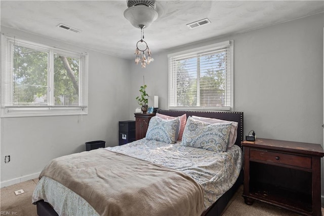 1201 Hale Dr, Hampton, VA 23663 - carpeted bedroom with multiple windows and baseboards