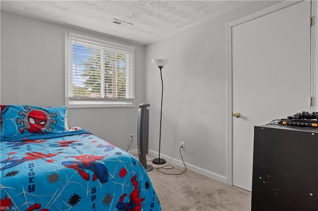1201 Hale Dr, Hampton, VA 23663 - carpeted bedroom with a textured ceiling