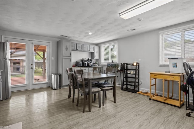 1201 Hale Dr, Hampton, VA 23663 - dining room with french doors and light wood-type flooring
