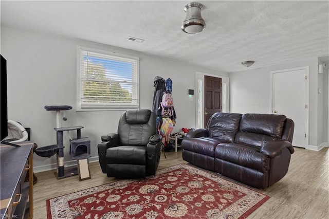 1201 Hale Dr, Hampton, VA 23663 - living room with wood finished floors and baseboards