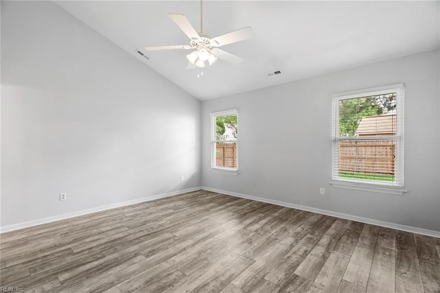 1016 Gauguin Dr, Virginia Beach, VA 23454 - spare room featuring wood finished floors, lofted ceiling, a ceiling fan, and baseboards