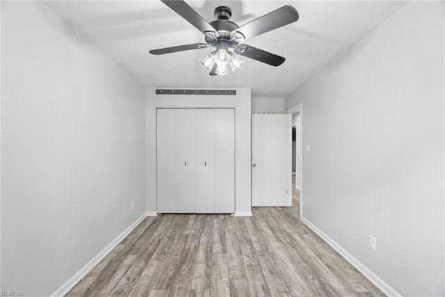 1016 Gauguin Dr, Virginia Beach, VA 23454 - unfurnished bedroom featuring wood finished floors, baseboards, a closet, and ceiling fan