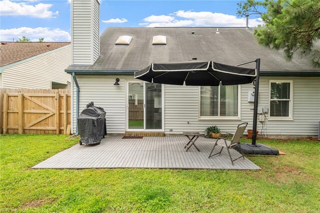 1016 Gauguin Dr, Virginia Beach, VA 23454 - rear view of house featuring a deck, a chimney, and a gate