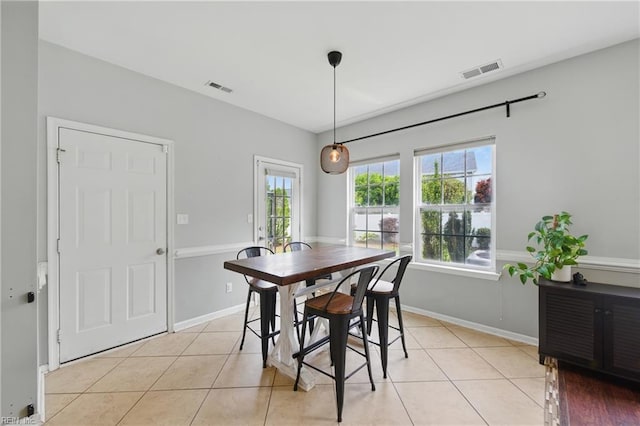 3507 Sedgefield St, Suffolk, VA 23435 - dining area with light tile patterned floors and baseboards