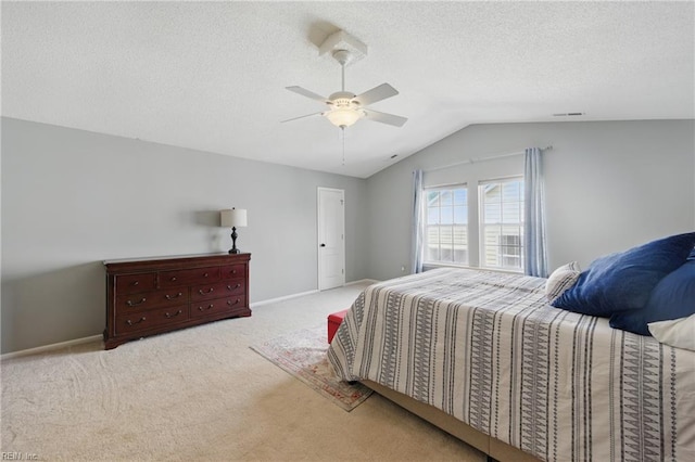 3507 Sedgefield St, Suffolk, VA 23435 - carpeted bedroom with vaulted ceiling, ceiling fan, baseboards, and a textured ceiling