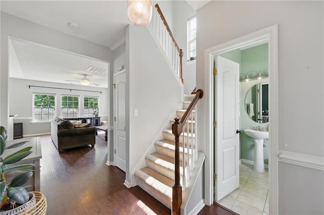 3507 Sedgefield St, Suffolk, VA 23435 - staircase with a ceiling fan, wood finished floors, and baseboards