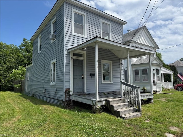 215 E Howard St, Hampton, VA 23663 - view of front of property featuring a porch and a front yard