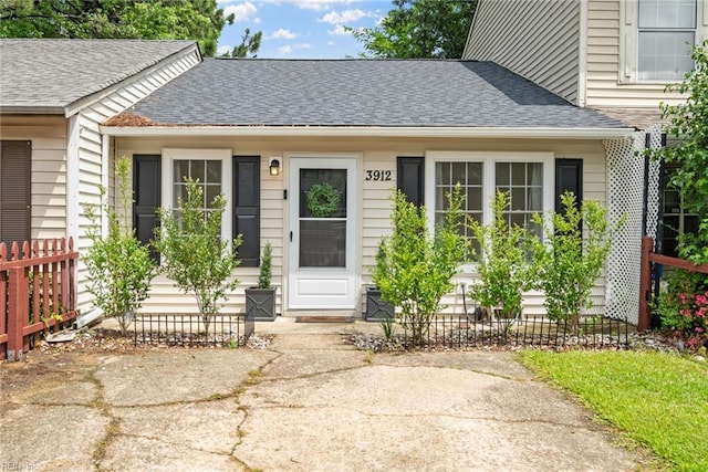 3912 Pollypine Dr, Virginia Beach, VA 23452 - doorway to property with roof with shingles