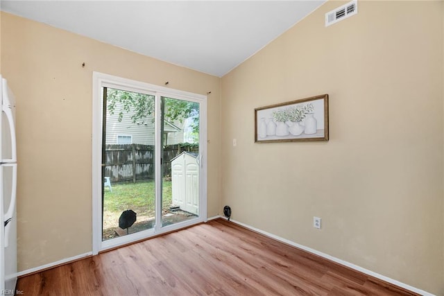 3912 Pollypine Dr, Virginia Beach, VA 23452 - spare room with wood finished floors, vaulted ceiling, and baseboards