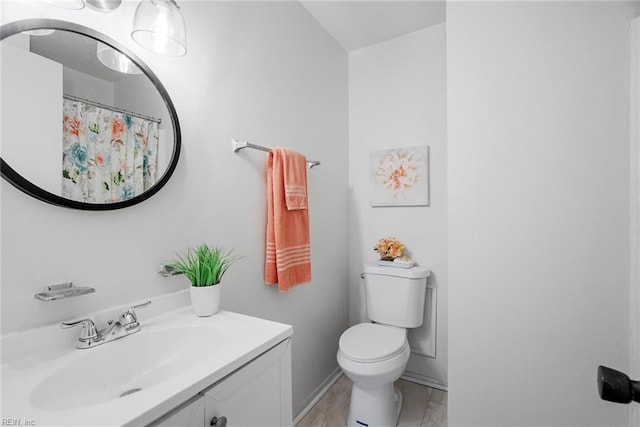 3912 Pollypine Dr, Virginia Beach, VA 23452 - full bathroom with toilet, vanity, marble finish flooring, and baseboards