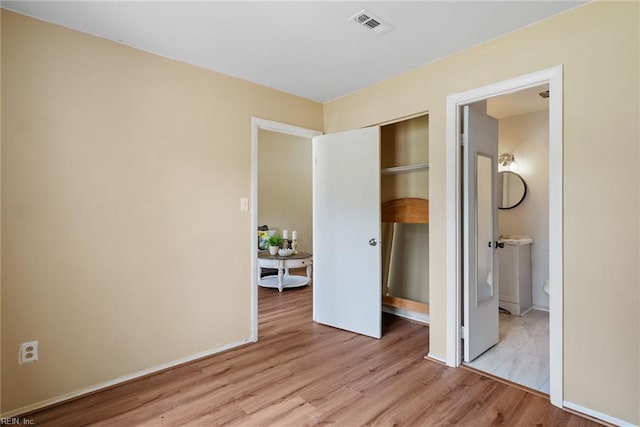 3912 Pollypine Dr, Virginia Beach, VA 23452 - unfurnished bedroom featuring light wood finished floors and a closet