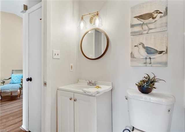 3912 Pollypine Dr, Virginia Beach, VA 23452 - half bath featuring toilet, vanity, and wood finished floors