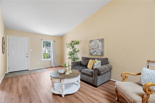 3912 Pollypine Dr, Virginia Beach, VA 23452 - living area featuring light wood-style flooring, lofted ceiling, and baseboards