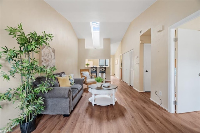 3912 Pollypine Dr, Virginia Beach, VA 23452 - living room with wood finished floors, baseboards, and high vaulted ceiling
