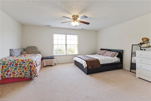 103 Barcroft Dr, Smithfield, VA 23430 - carpeted bedroom featuring a ceiling fan, baseboards, and a textured ceiling