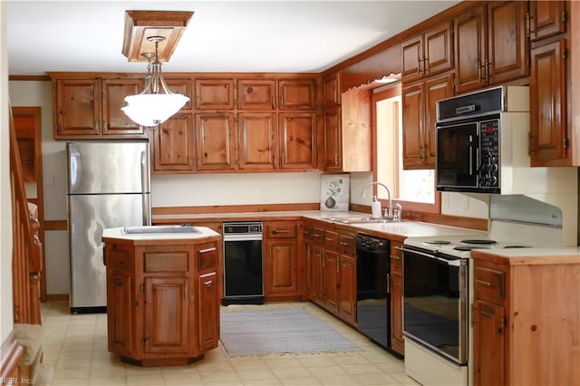 1328 Harris Rd, Virginia Beach, VA 23452 - kitchen featuring black appliances, light countertops, decorative light fixtures, and a sink