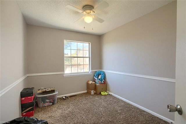 2117 King James Ct, Carrollton, VA 23314 - game room featuring ceiling fan, carpet floors, baseboards, and a textured ceiling