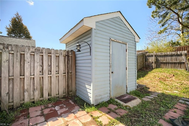 2117 King James Ct, Carrollton, VA 23314 - view of shed with a fenced backyard