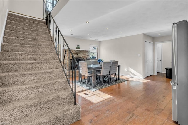 5260 Iowa Ave, Norfolk, VA 23513 - dining space featuring stairs, hardwood / wood-style flooring, recessed lighting, and baseboards