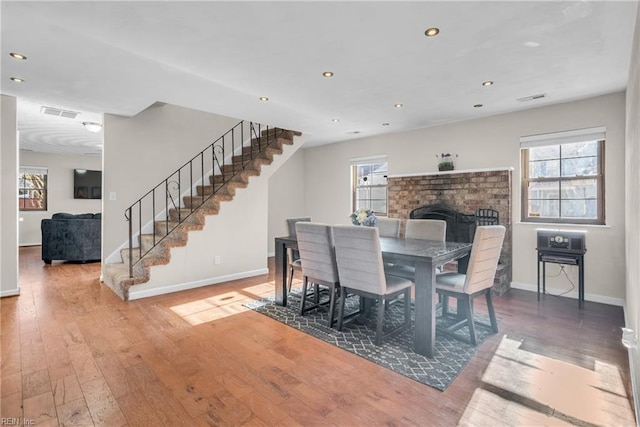 5260 Iowa Ave, Norfolk, VA 23513 - dining area with healthy amount of natural light, stairway, baseboards, hardwood / wood-style floors, and recessed lighting
