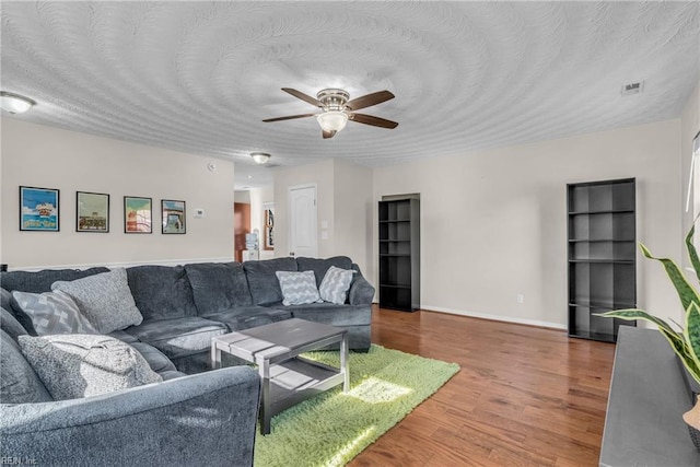 5260 Iowa Ave, Norfolk, VA 23513 - living area featuring ceiling fan, wood finished floors, and baseboards