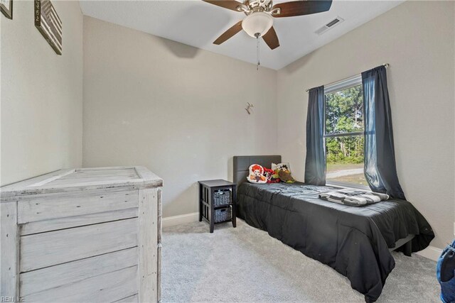 554 Trotman Rd, Camden, NC 27921 - bedroom with carpet flooring, baseboards, and ceiling fan