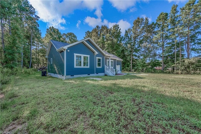 554 Trotman Rd, Camden, NC 27921 - rear view of house featuring crawl space, entry steps, a yard, and central AC