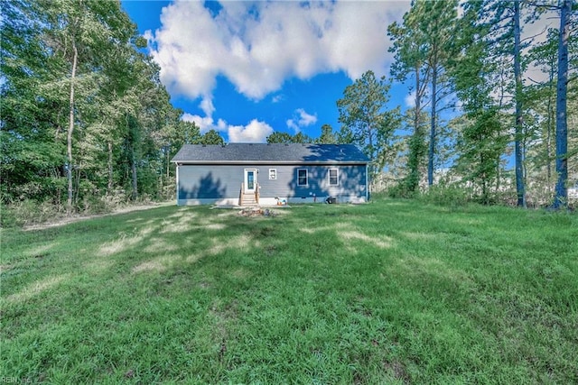 554 Trotman Rd, Camden, NC 27921 - rear view of property with entry steps and a yard