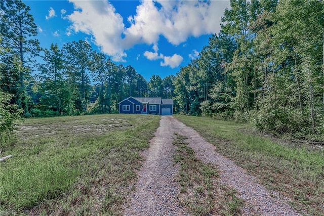 554 Trotman Rd, Camden, NC 27921 - view of front facade with a forest view and driveway