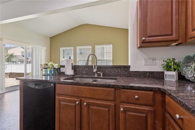 648 Sea Turtle Way, Newport News, VA 23601 - kitchen with dishwasher, vaulted ceiling, dark stone counters, and brown cabinets