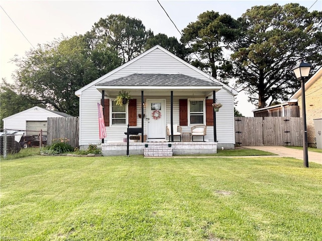 1135 Virginia Ave, Chesapeake, VA 23324 - bungalow-style house featuring covered porch and a shingled roof