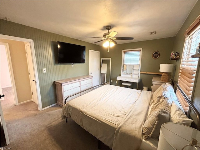 1135 Virginia Ave, Chesapeake, VA 23324 - bedroom featuring light carpet, baseboards, multiple windows, and ceiling fan