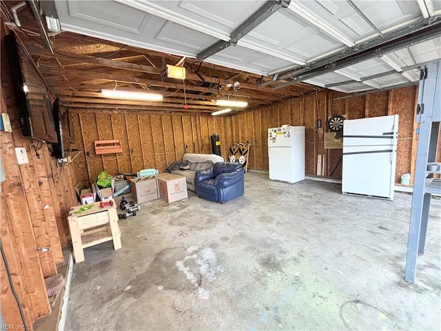 1135 Virginia Ave, Chesapeake, VA 23324 - garage with freestanding refrigerator and a garage door opener