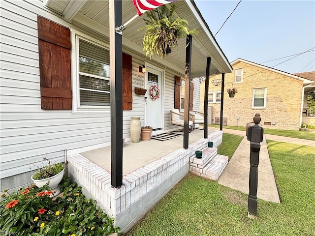 1135 Virginia Ave, Chesapeake, VA 23324 - porch featuring a yard