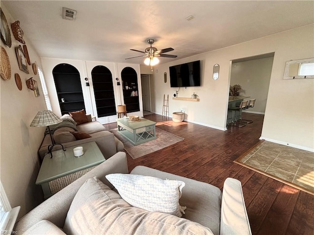 1135 Virginia Ave, Chesapeake, VA 23324 - living room with wood-type flooring, a ceiling fan, and baseboards