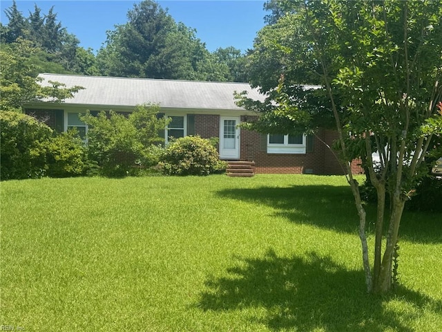2643 Woodford Ave, Hayes, VA 23072 - view of front facade with entry steps, a front yard, and brick siding