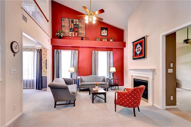 6716 Tarpleys Tavern Rd, Williamsburg, VA 23188 - carpeted living room featuring ceiling fan, high vaulted ceiling, and a glass covered fireplace