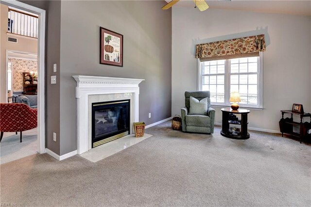 6716 Tarpleys Tavern Rd, Williamsburg, VA 23188 - sitting room featuring carpet, a fireplace, lofted ceiling, and a ceiling fan