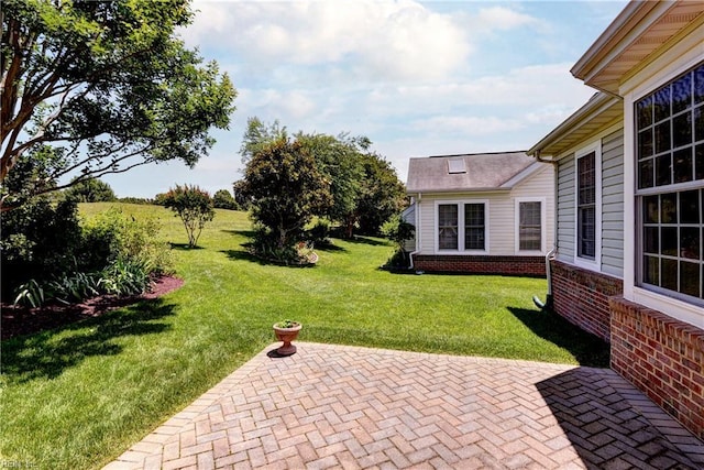 6716 Tarpleys Tavern Rd, Williamsburg, VA 23188 - view of green lawn featuring a patio area