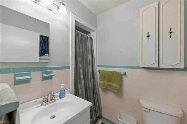 1348 Carlton Ct, Norfolk, VA 23503 - full bath with tile walls, toilet, curtained shower, vanity, and wainscoting