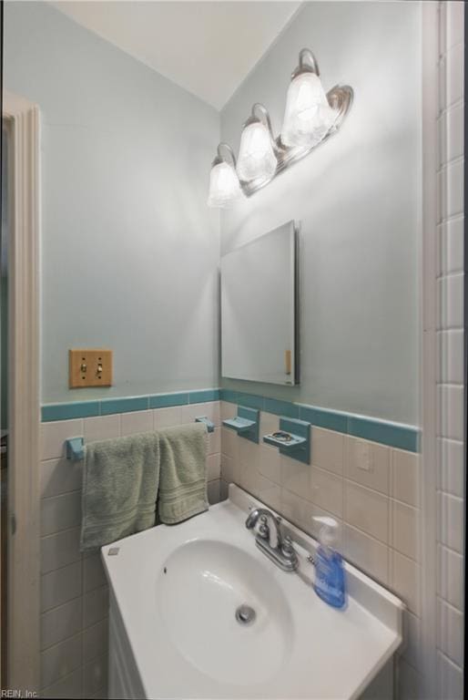 1348 Carlton Ct, Norfolk, VA 23503 - bathroom featuring tile walls, vanity, and a wainscoted wall