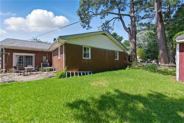 1348 Carlton Ct, Norfolk, VA 23503 - rear view of property with brick siding, a patio, a yard, and central AC unit