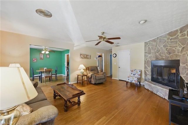 1348 Carlton Ct, Norfolk, VA 23503 - living area featuring a ceiling fan, wood finished floors, a fireplace, and baseboards