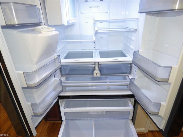 521 Simpson Ln, Chesapeake, VA 23323 - detailed view of fridge and wood finished floors