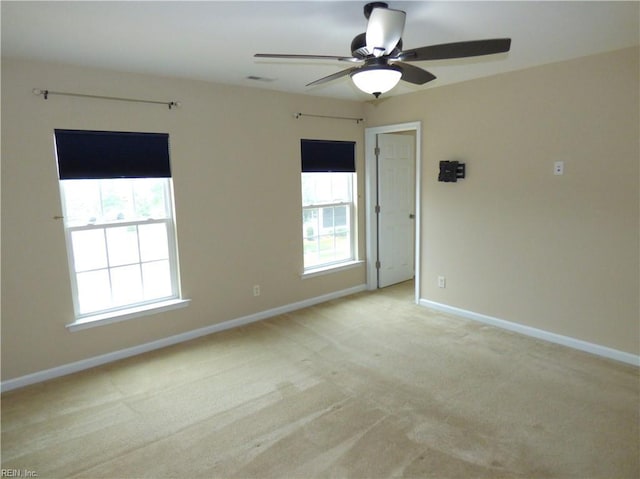521 Simpson Ln, Chesapeake, VA 23323 - empty room featuring light colored carpet, a ceiling fan, and baseboards